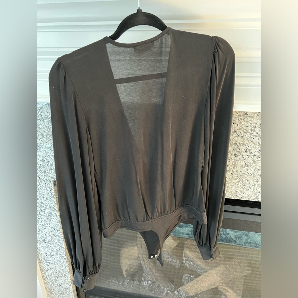 Black body suite. Size small. Worn once. From lovers and friends.